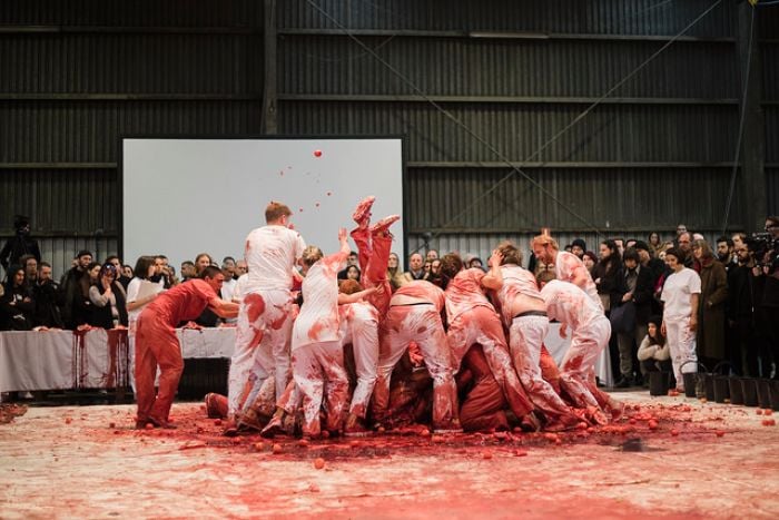 Herman Nitsch, 150.action at Dark MOFO 2017. Performers cut open a bull carcass and rolled around in the entrails, to the dismay of animal rights activists. Photo courtesy of Dark Mofo/Lusy Productions.