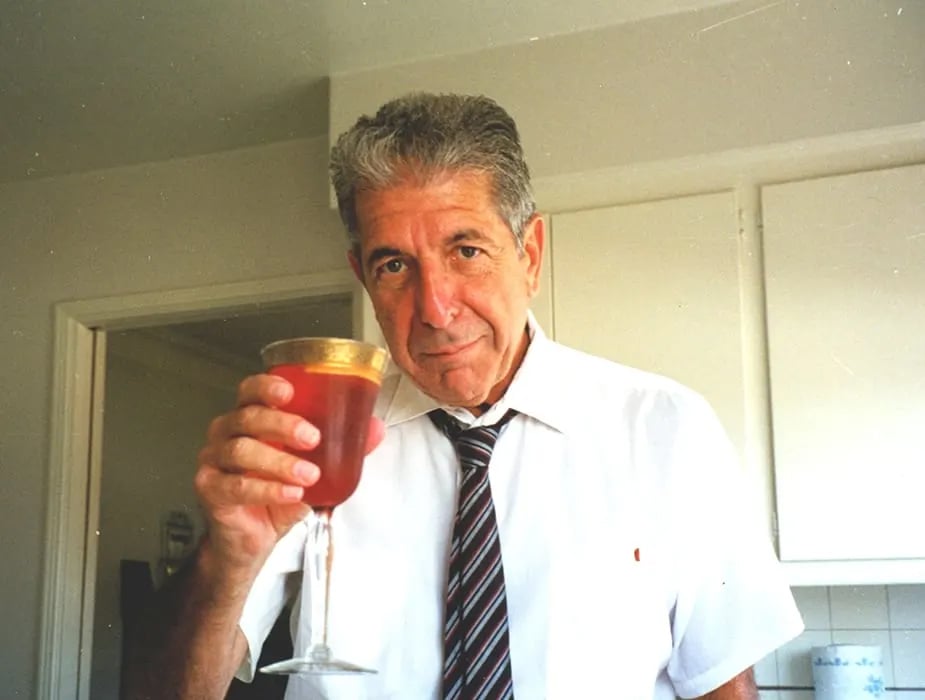 Leonard Cohen with the Red Needle in his Los Angeles home in 1999. Photo ©Jarkko Arjatsalo, the Leonard Cohen Files.