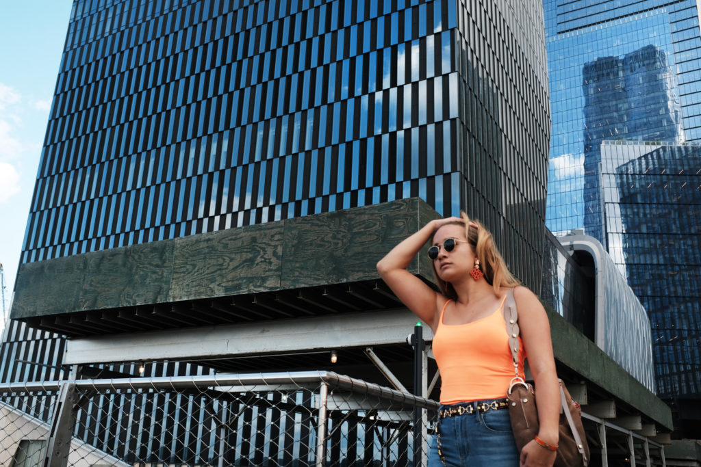 A passerby in front of one of the condo towers at Hudson Yards. (Photo by Spencer Platt/Getty Images)