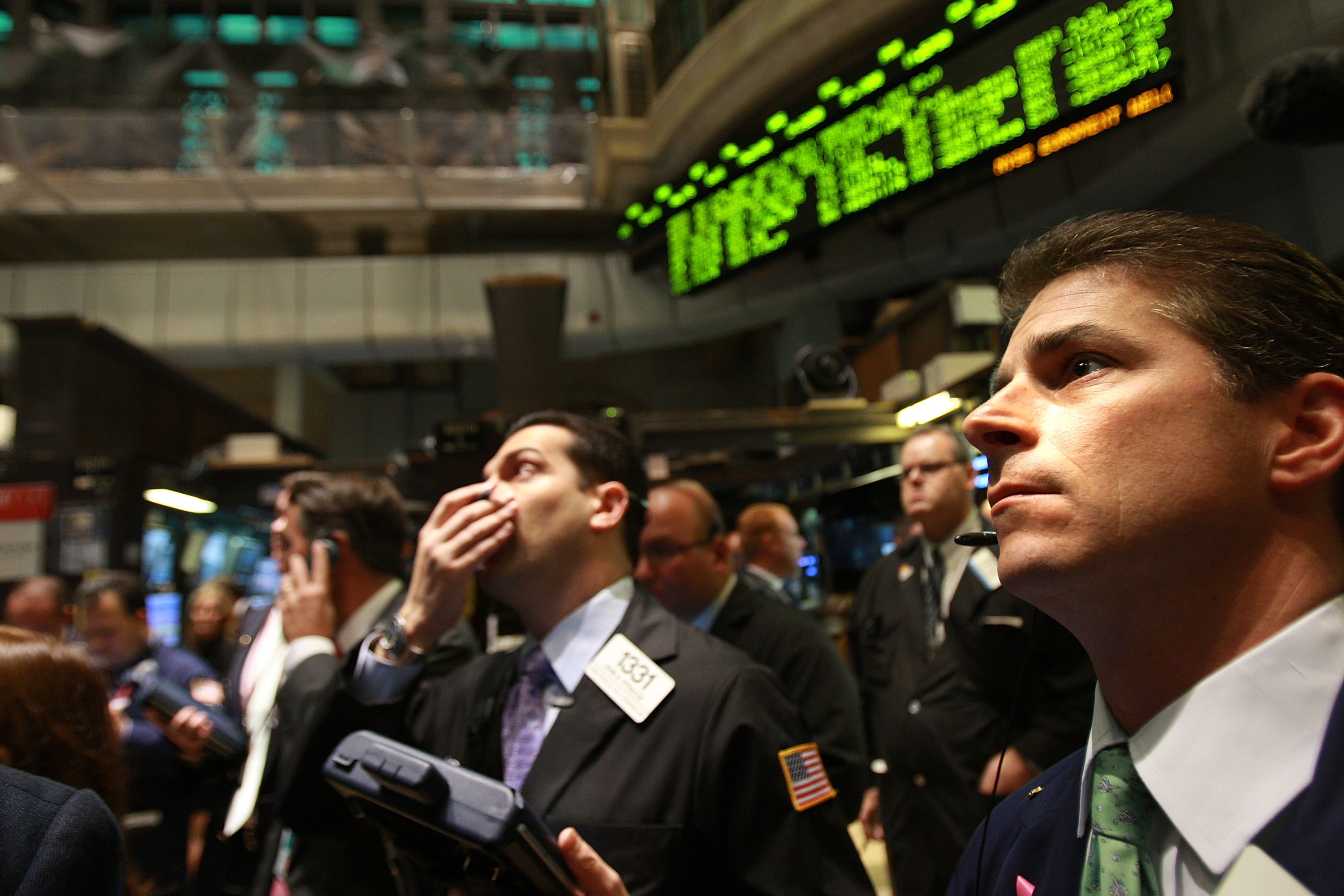 Traders work on the floor of the New York Stock Exchange moments after the opening bell on October 13, 2008. Photo by Spencer Platt/Getty Images.