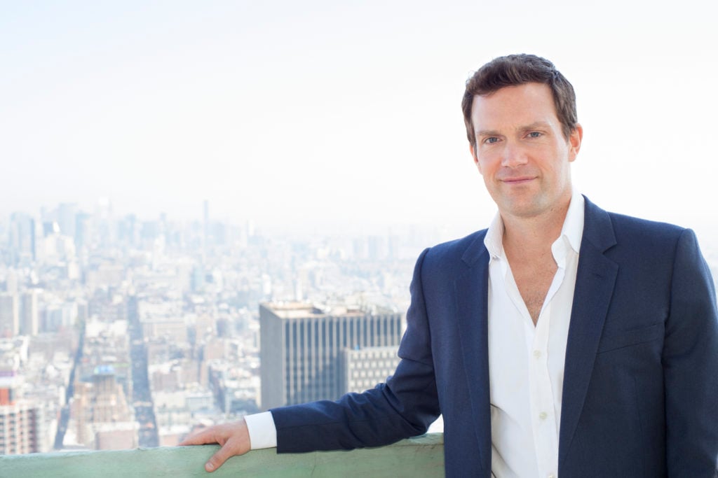 artnet CEO Jacob Pabst standing atop the company's offices in the Woolworth Building. Courtesy of Jacob Pabst.