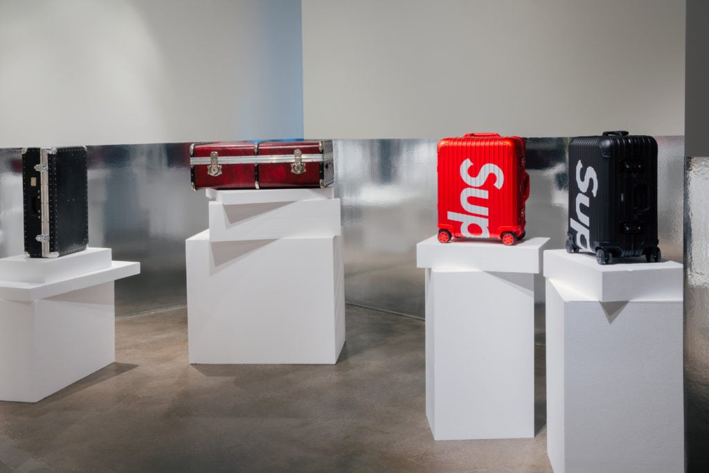 The show includes examples of Rimowa collaborations with major artists and designers like Dior and Supreme.