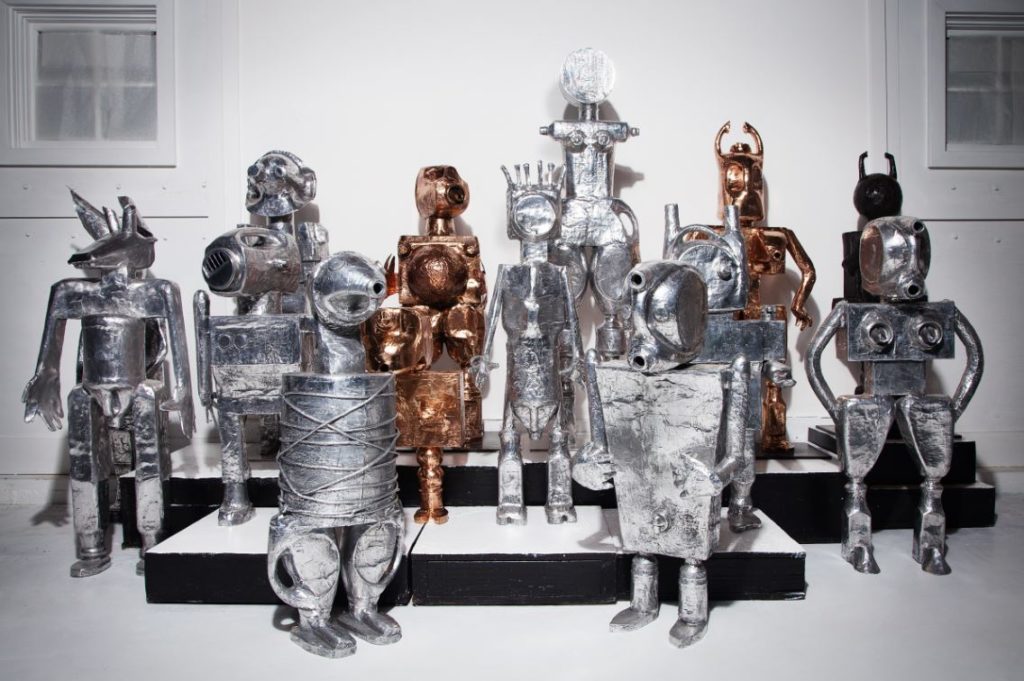 Robots and Femmebots in polished bronze and aluminum. Photo by Steve Benisty.