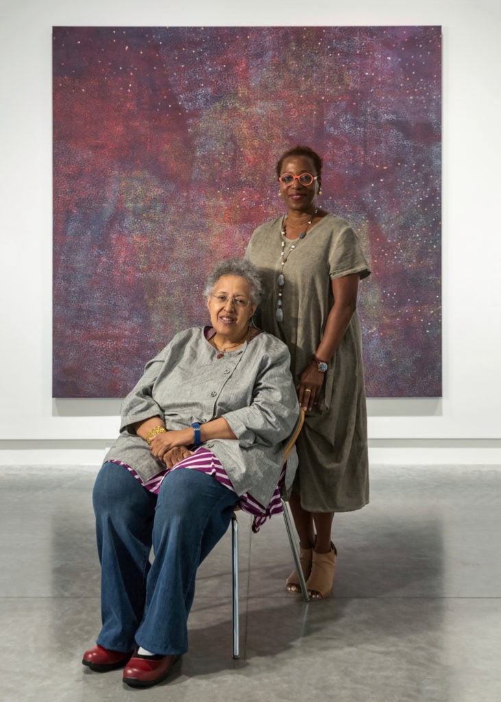 Artist Howardena Pindell with exhibition co-curator Valerie Cassel Oliver, at the Virginia Museum of Fine Arts retrospective "What Remains to be Seen." Courtesy of VMFA.