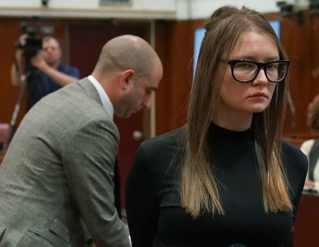 Anna Sorokin (aka Anna Delvey) is led away after being sentenced in Manhattan Supreme Court May 9, 2019 following her conviction last month on multiple counts of grand larceny and theft of services. Photo: Timothy A. Clary/AFP/Getty Images.