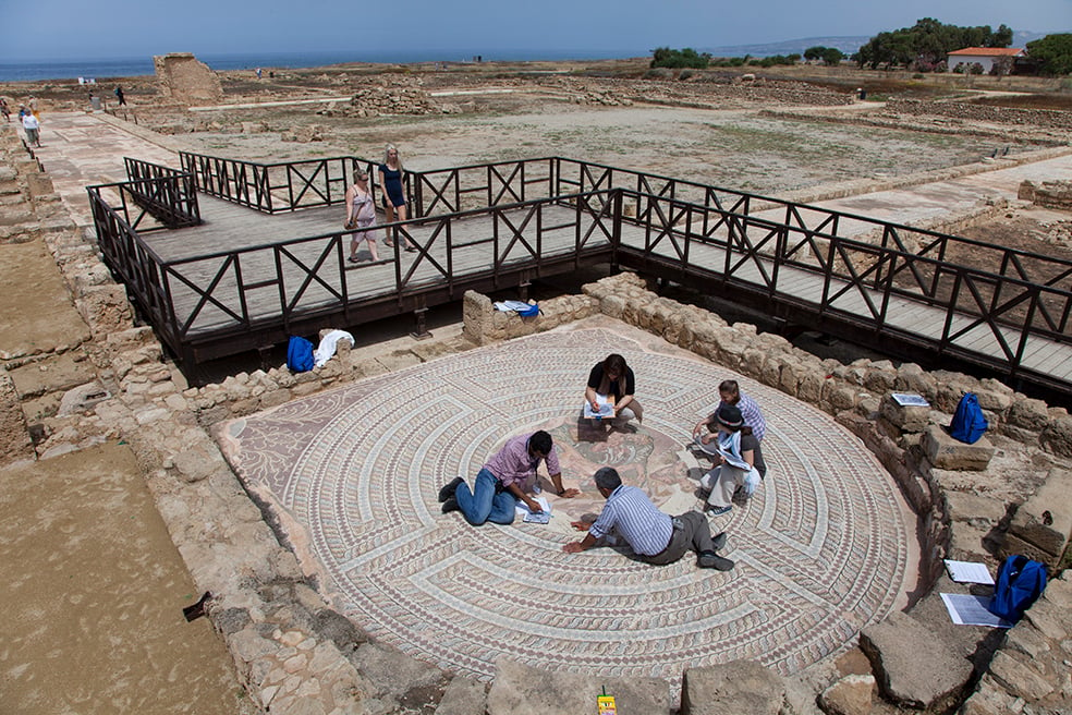 Participants in the 2014 Mosaikon course Conservation and Management of Archaeological Sites with Mosaics conduct a condition survey exercise of the Achilles Mosaic at the Paphos Archeological Park, Paphos, Cyprus. Courtesy of the J. Paul Getty Trust.