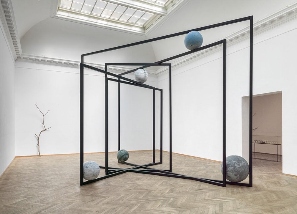 Alicja Kwade, installation view of <em>Out of Ousia</em> (2018) at the Kunsthal Charlottenborg. Photo by Roman März courtesy the artist, KÖNIG GALERIE, and 303 Gallery, New York.