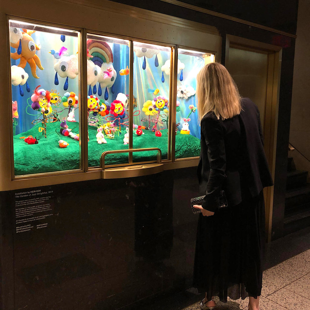 Casey Fremont in front of Hein Koh’s Art Sundae installation at Rockefeller Center. Photo courtesy Casey Fremont.