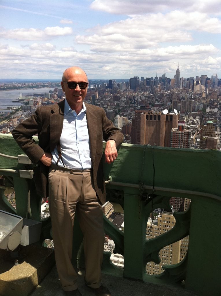 artnet founder Hans Neuendorf atop the company's current offices in the Woolworth Building, overlooking downtown New York. Photo courtesy of Jacob Pabst.