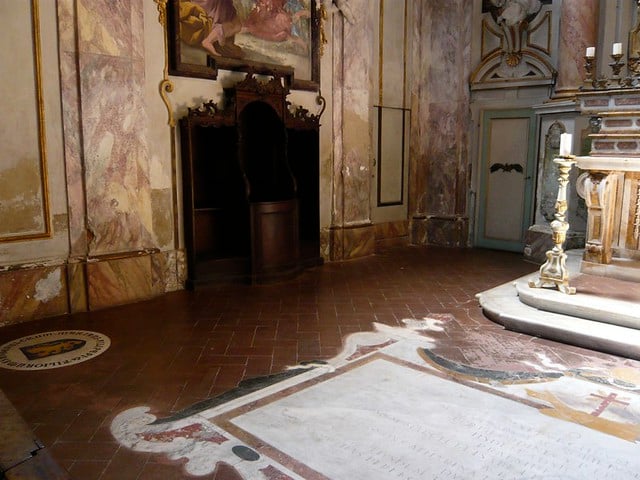 Botticelli is bured at Chiesa di San Salvatore in Ognissanti, Florence. His burial place is marked by the circular eblem on the floor, while the banner emblem marks the burial place of Florentine noblewoman Simonetta Vesspucci.