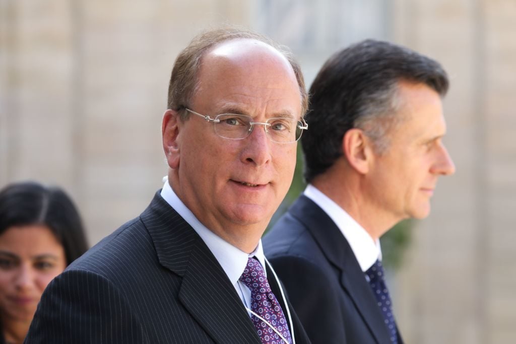 BlackRock chairman and CEO Larry Fink leaves after a meeting about climate action investments with heads of sovereign wealth funds and French President at the Elysee Palace in Paris on July 10, 2019. (Photo credit: LUDOVIC MARIN/AFP/Getty Images)