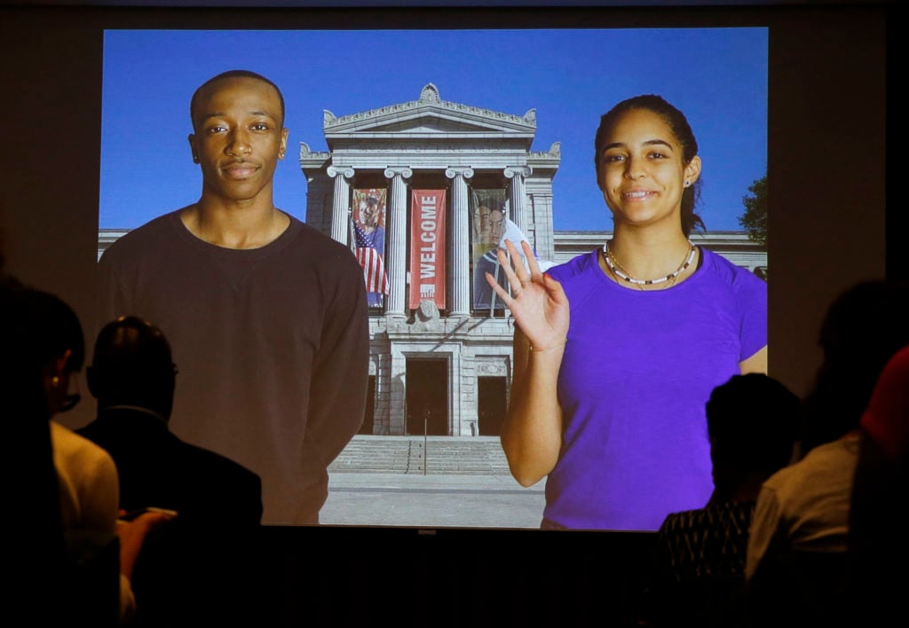 A group of educators and community roundtable participants watch a video designed to help familiarize students and group organizers with the Museum of Fine Arts Boston on Oct. 2, 2019. Photo: Jessica Rinaldi/The Boston Globe via Getty Images.