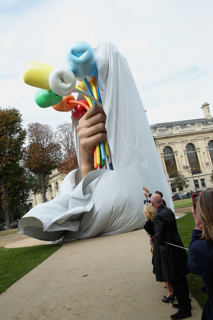 The unveiling of Jeff Koons's <i>Bouquet of Tulips</i> in Paris. Photo by Bertrand Rindoff Petroff/Getty Images.