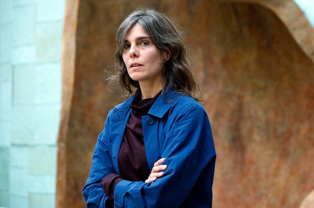 Katinka Bock poses in front of her sculpture Rauschen at Lafayette Anticipations. Photo by Thierry Chesnot/Getty Images.