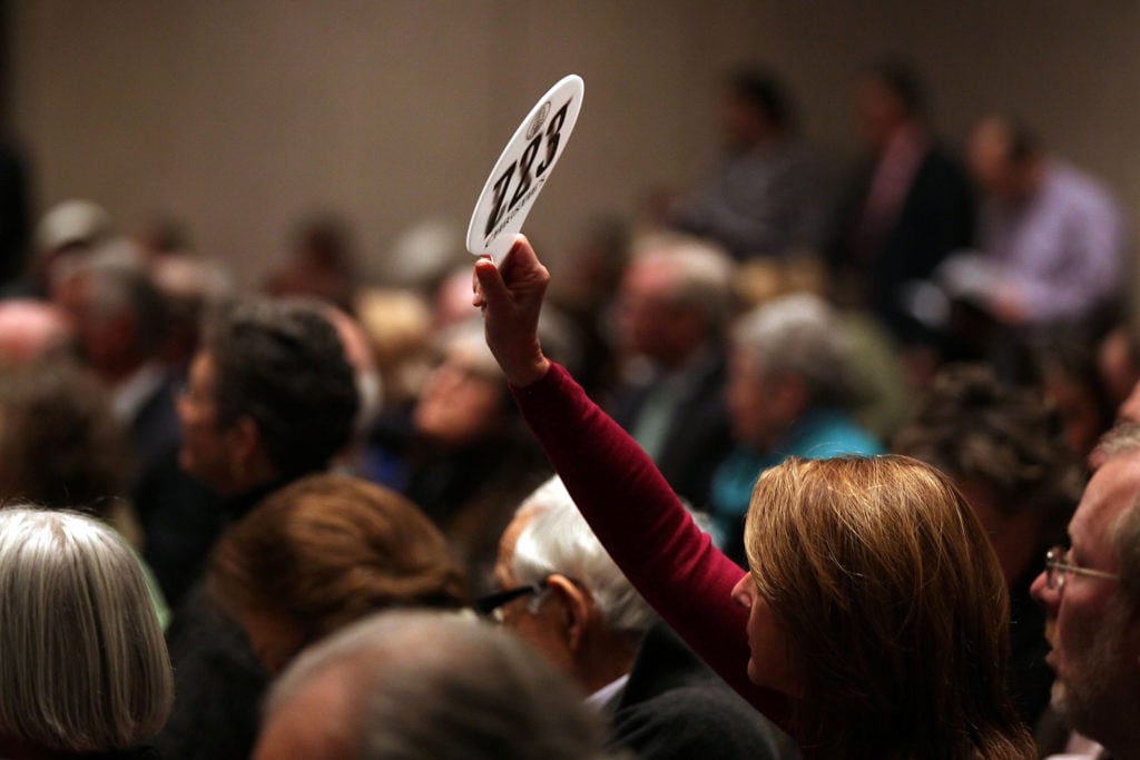 Bidders at Christie's New York. Photo by Spencer Platt/Getty Images.