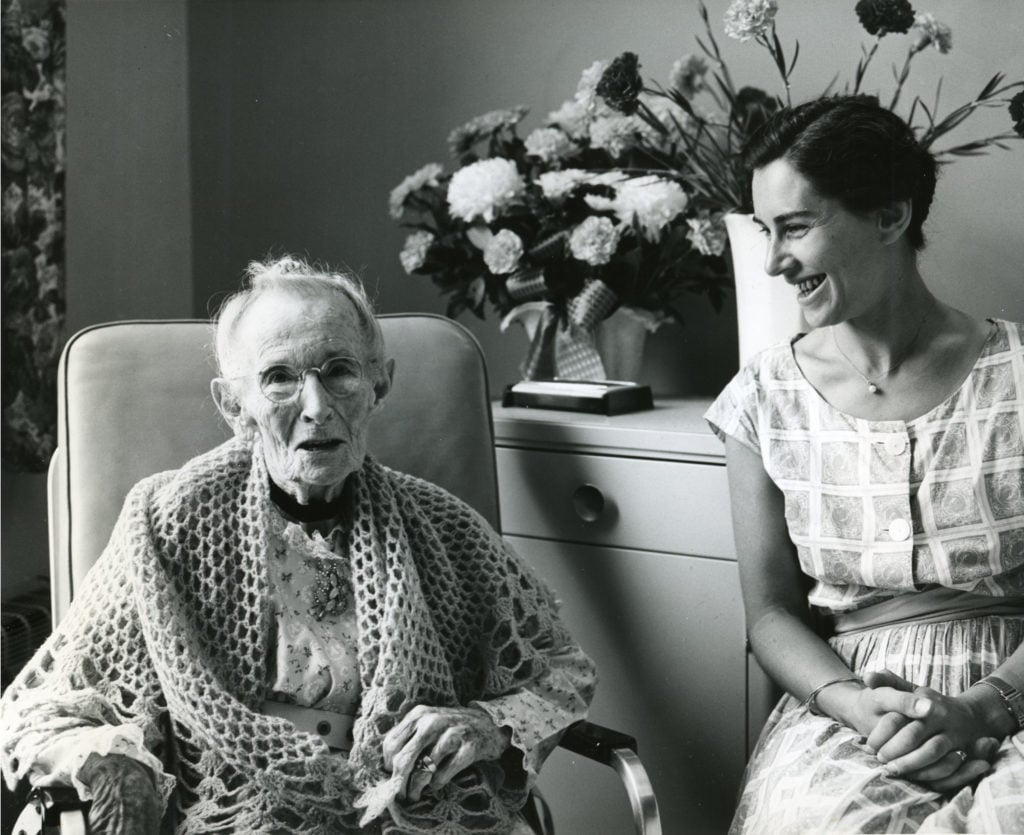 Hildegard Bachert, at right, with Grandma Moses on her 100th birthday in 1961. Photo by Otto Kallir, courtesy of Galerie St. Etienne.