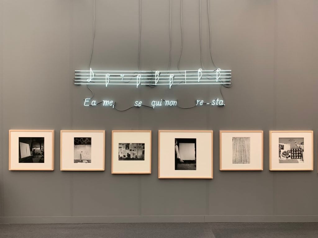 Photos of artists by Ugo Mulas and a neon by Joseph Kosuth. Photo by Andrew Goldstein.