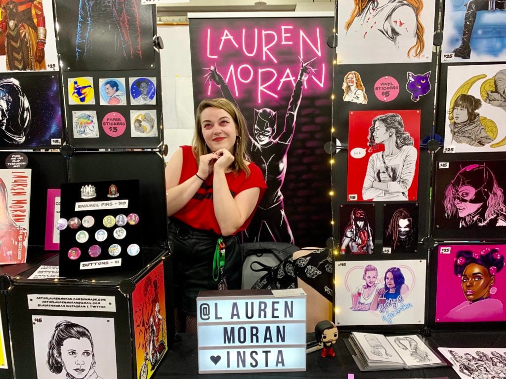 Lauren Moran at her booth in Artist Alley at New York Comic Con. Photo by Sarah Cascone. 
