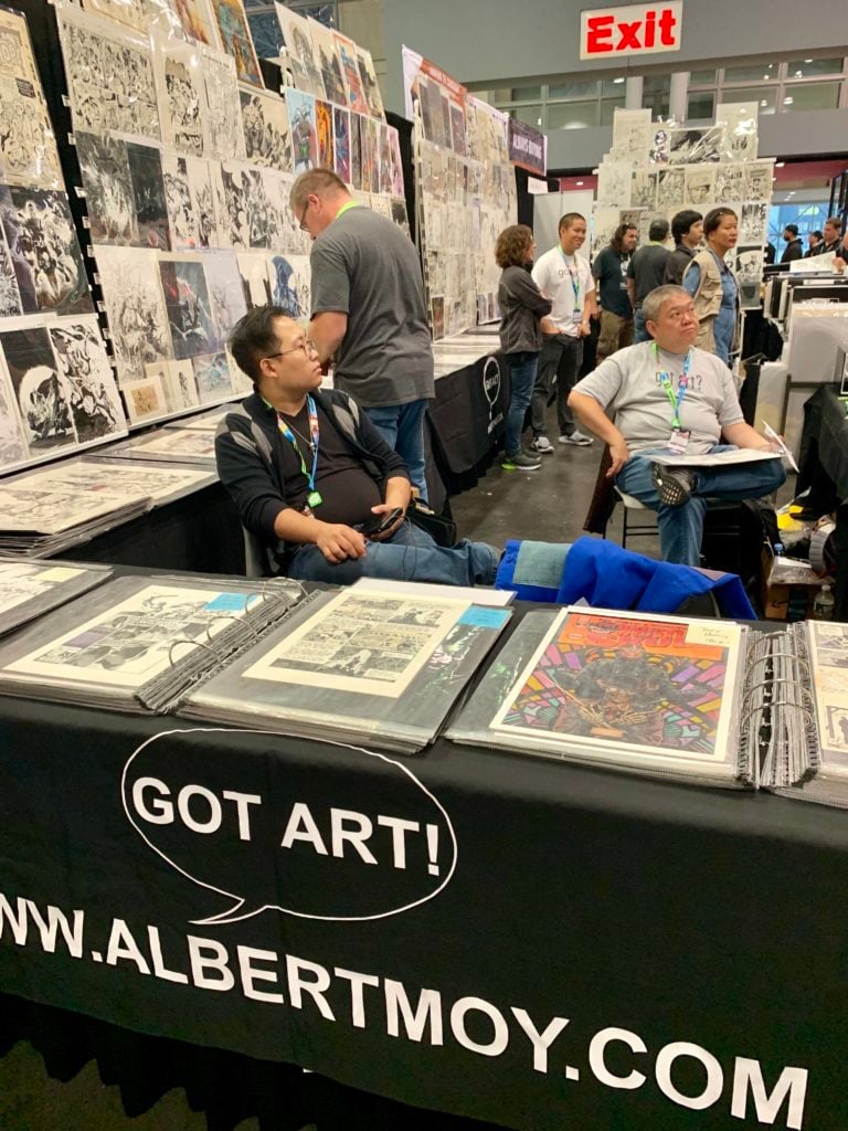 Comic art from art gallery Albert Moy for sale at New York Comic Con. Photo by Sarah Cascone. 