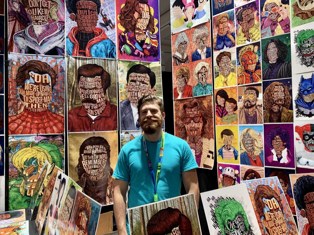 Nate Jones with his work at New York Comic Con. Photo by Sarah Cascone. 
