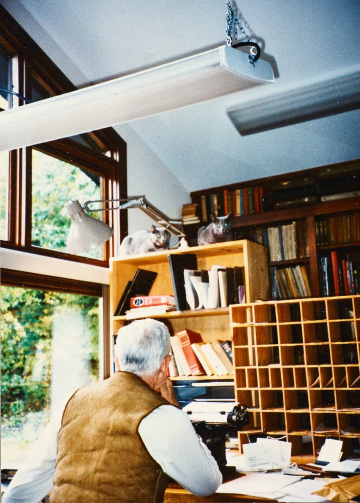 J.D. Salinger at his writing desk in his home in Cornish, New Hampshire (1993). Photo courtesy of the the New York Public Library, Astor Lenox and Tilden Foundations, and the J.D. Salinger Trust.