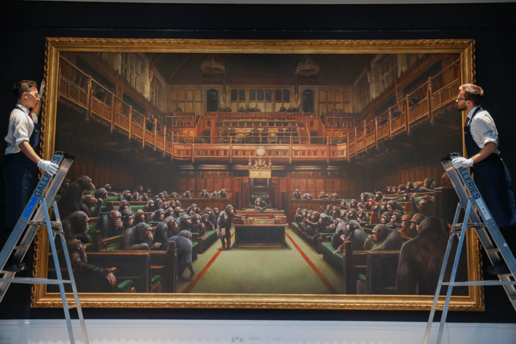 Banksy's Devolved Parliament (2009) sold for $12 million at Sotheby's London Auction during Frieze Week. Photo: Tristan Fewings/Getty for Sotheby's.