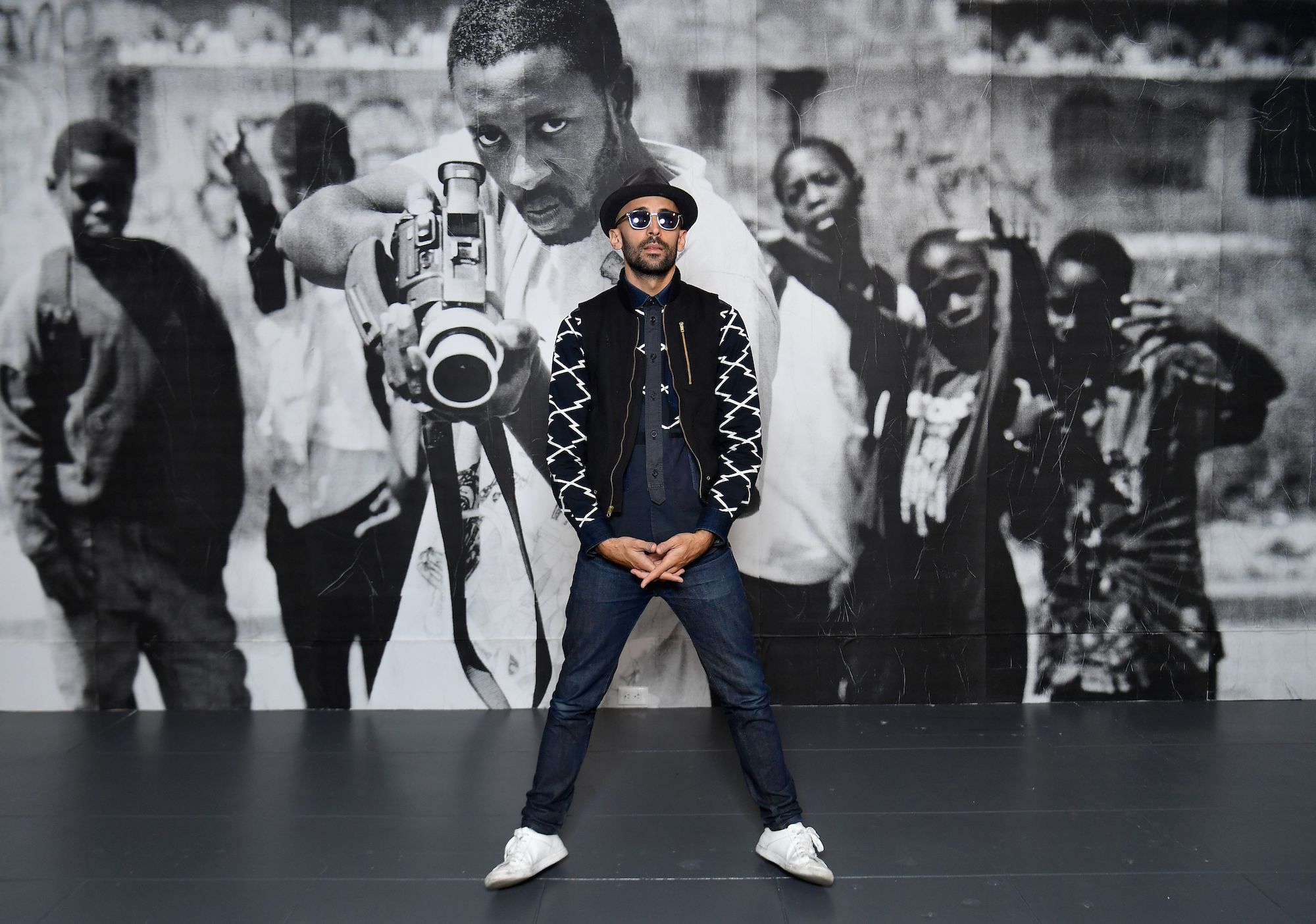 JR at his exhibition "JR: Chronicles" at the Brooklyn Museum on October 2, 2019 in New York City. Photo by Angela Weiss/AFP via Getty Images.