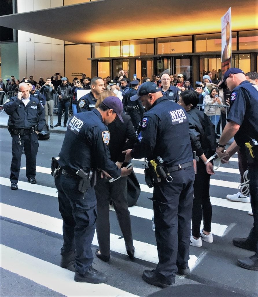 Mark-Viverito is arrested in front of the Museum of Modern Art as part of a #CancelTheDebt protest on October 21. <br>Image: Eileen Kinsella.