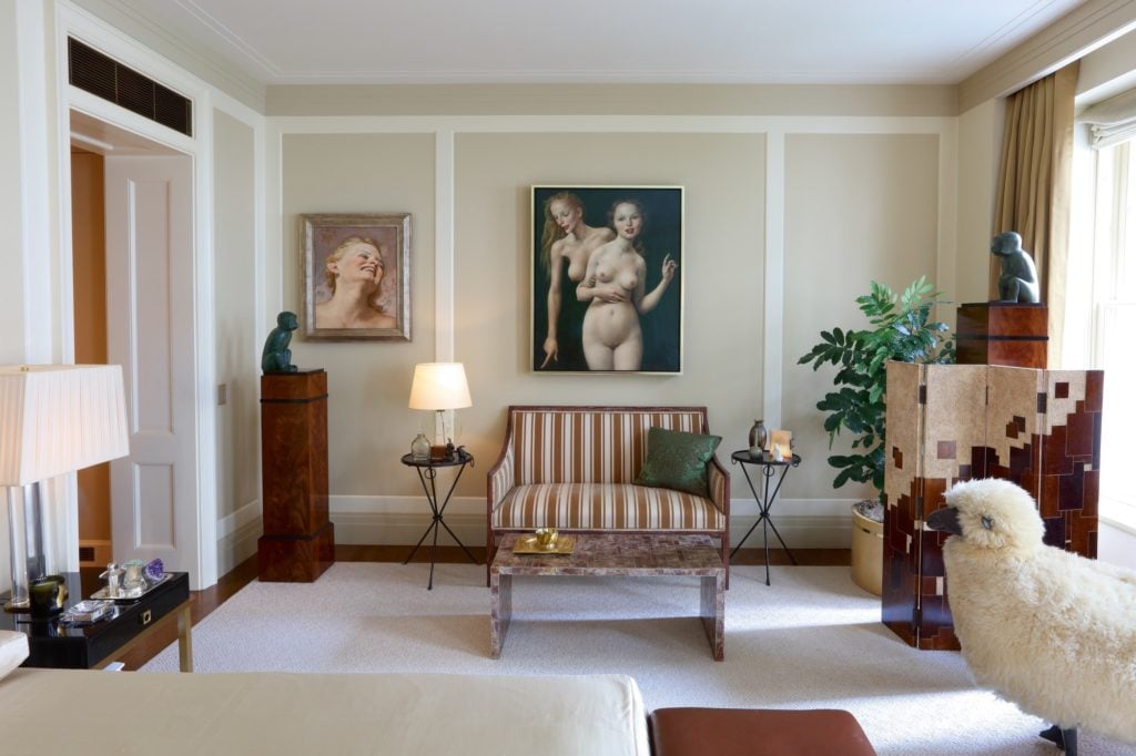 Marc Jacobs's living room with John Currin's <em>Helena</em> (left), estimated at $500,000–700,000. Photo by Victoria Stevens courtesy of Sotheby's New York.