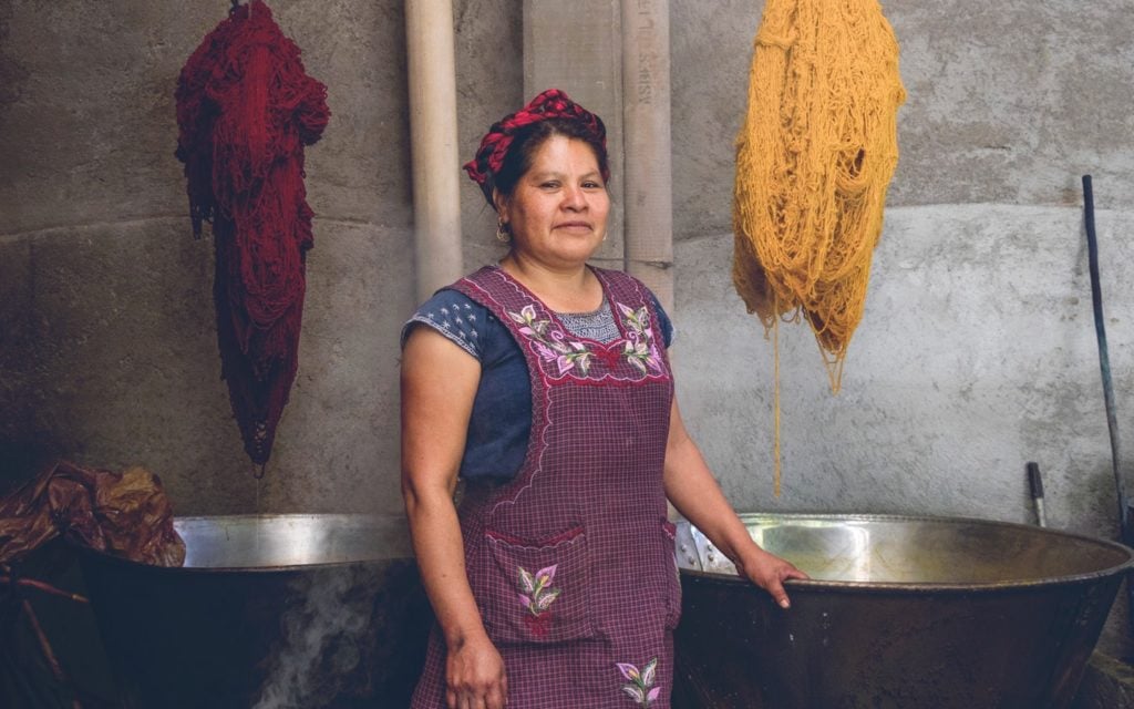 Vacation With an Artist offers unique apprenticeship vacations with artists like Juana, who teaches natural dyeing and indigenous weaving from her home and studio in Oaxaca, Mexico. Photo courtesy of Vacation With an Artist.