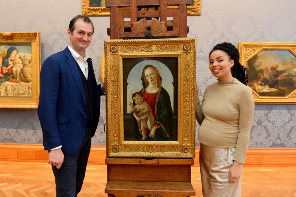 Bendor Grosvenor and Emma Dabiri, the presenters of the TV show <em>Britain's Lost Masterpieces</em>, Bendor Grosvenor and Emma Dabiri, with Botticelli's <i>Madonna and Child</i>. Picture courtesy of National Museums Wales.