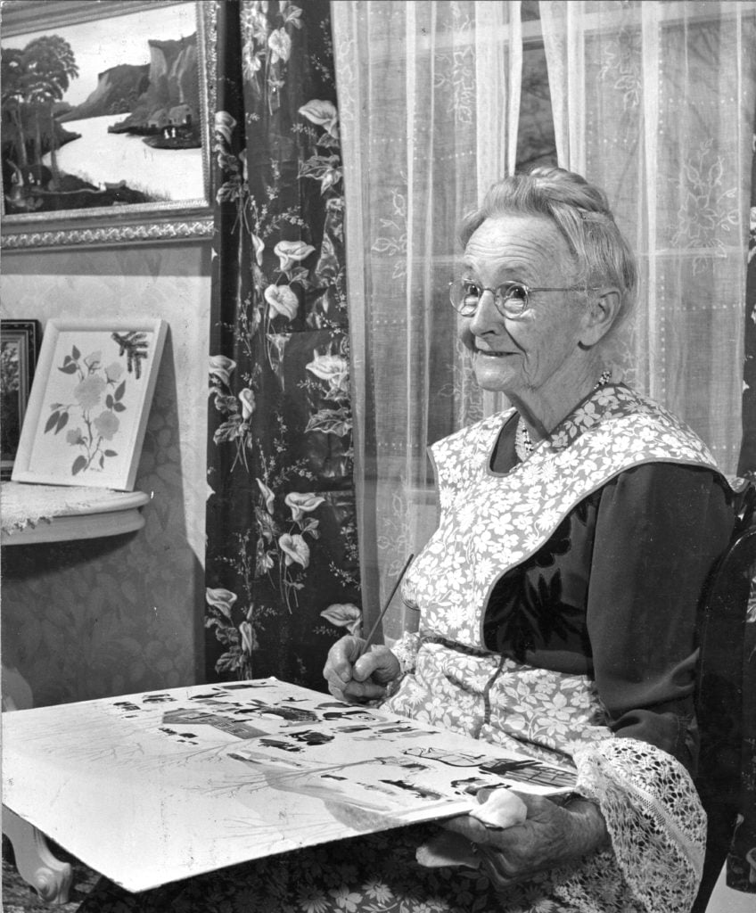 Portrait of American artist Anna Mary Robertson Moses (1860 - 1961), better known as Grandma Moses as she paints, June 7, 1944. (Photo by PhotoQuest/Getty Images)