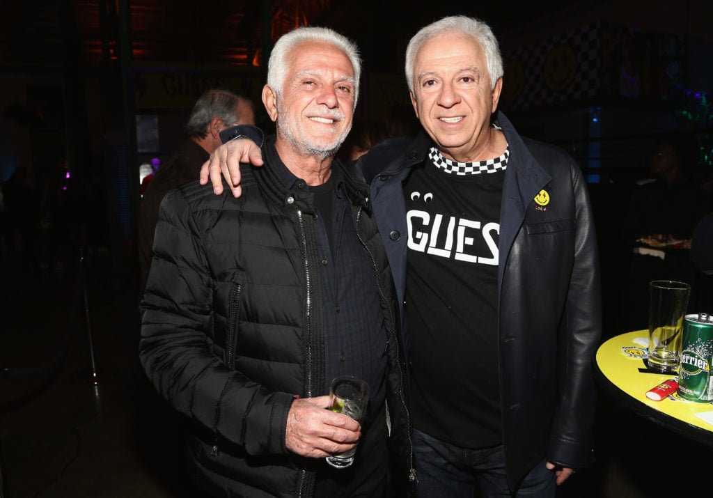 Maurice Marciano (left) and Paul Marciano. Photo by Tommaso Boddi/Getty Images for GUESS.