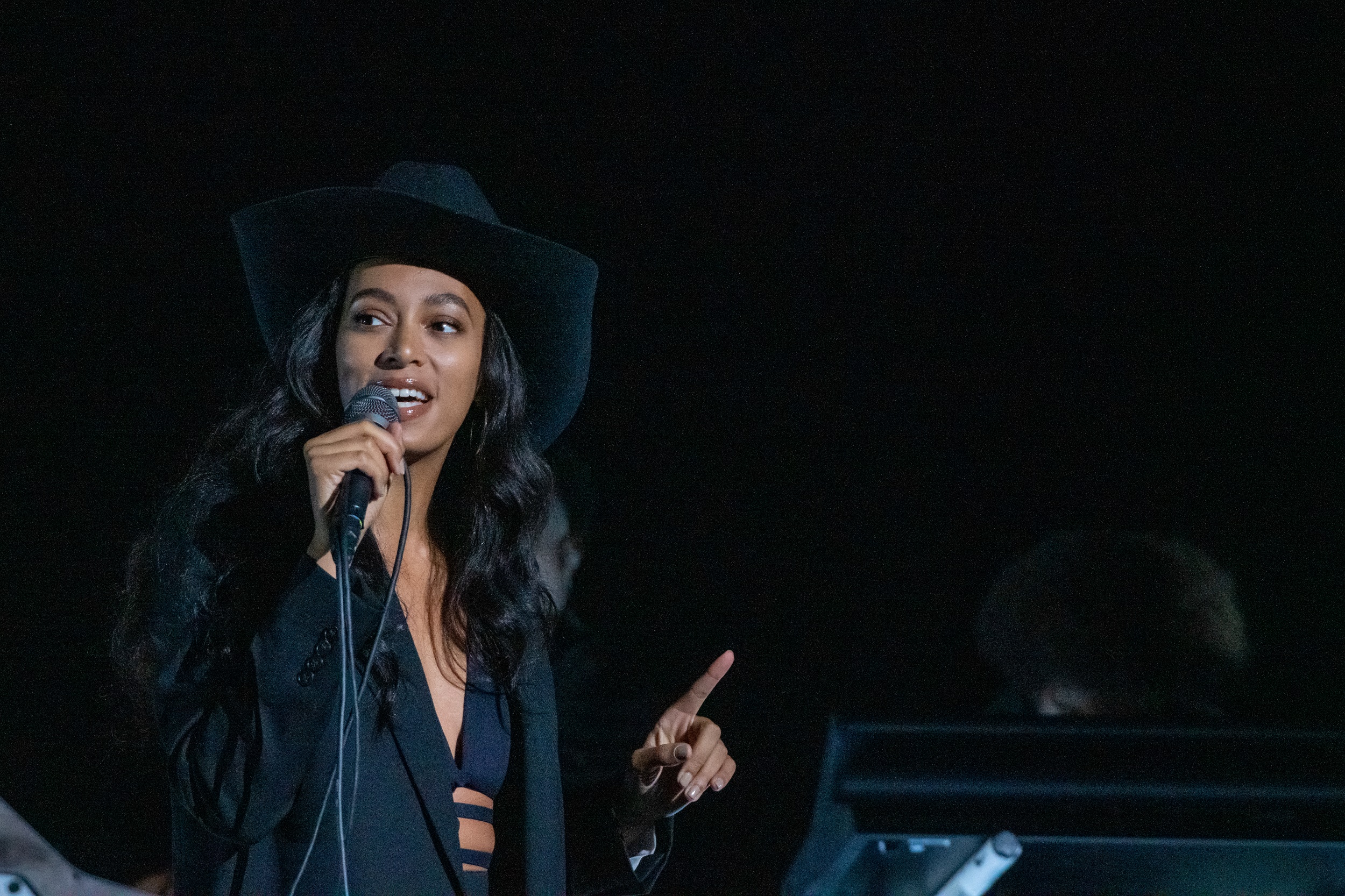 Solange performing on stage, 2019. (Photo by Julia Reinhart/Redferns).