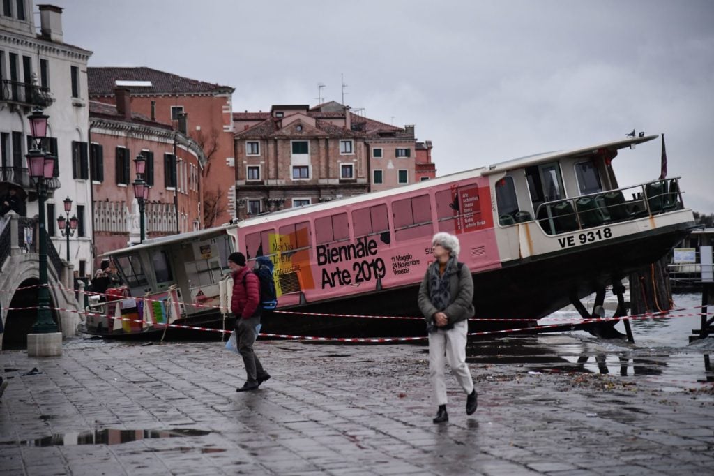 A stranded waterbus after being washed away by an exeptionally high tide, November 13, 2019 in Venice. Photo by Marco Bertorello AFP via Getty Images.
