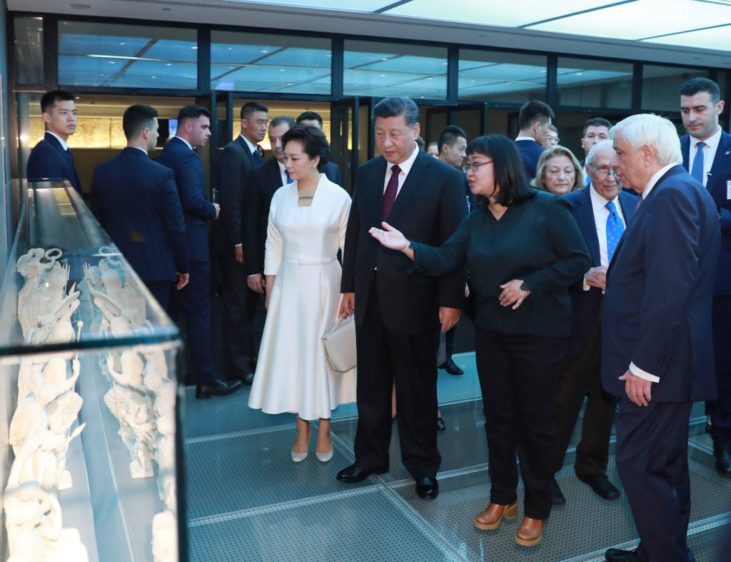 Chinese President Xi Jinping and his wife Peng Liyuan visit the Acropolis Museum accompanied by Greek President Prokopis Pavlopoulos and his wife Vlassia Pavlopoulou-Peltsemi in Athens, Greece, Nov. 12, 2019. Photo: Ding Lin/Xinhua via Getty via Getty Images.