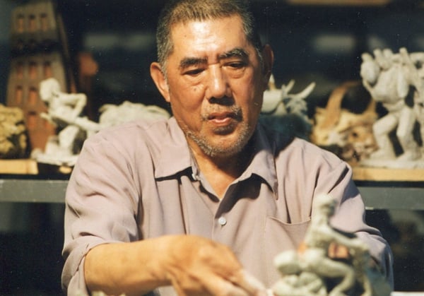 Liu Shiming working on a sculpture in his studio. Courtesy of Central Academy of Fine Arts and Asian Cultural Center.
