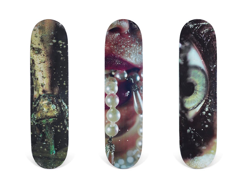 A set of three Marilyn Minter Shoe, Eye, & Necklace skateboards, Supreme (2008). Image courtesy of Christie's.