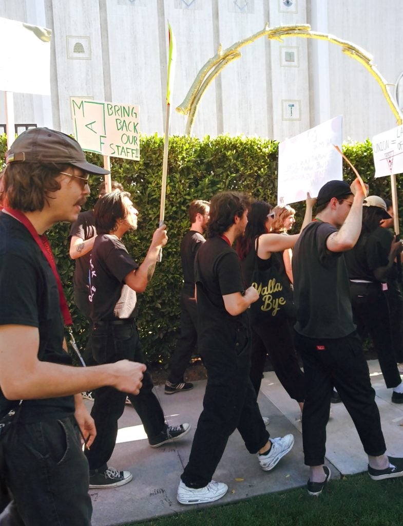 Workers march outside of the Marciano Foundation in Los Angeles. Photo: Catherine Wagley.