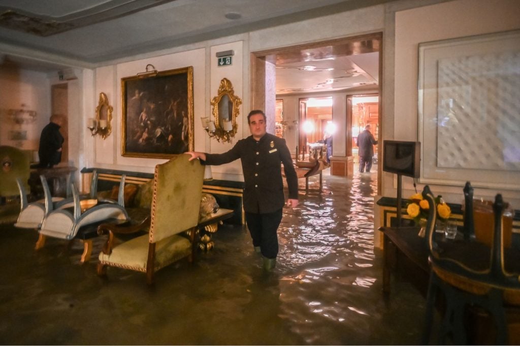 A room in the flooded Gritti Palace during the floods on November 12 in Venice. Photo by Marco Bertorello/AFP via Getty Images.