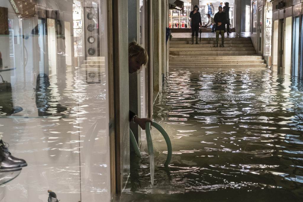  pharmacy uses an electric pump during the floods in Venice on November 12, 2019. Photo by Stefano Mazzola/Awakening/Getty Images.