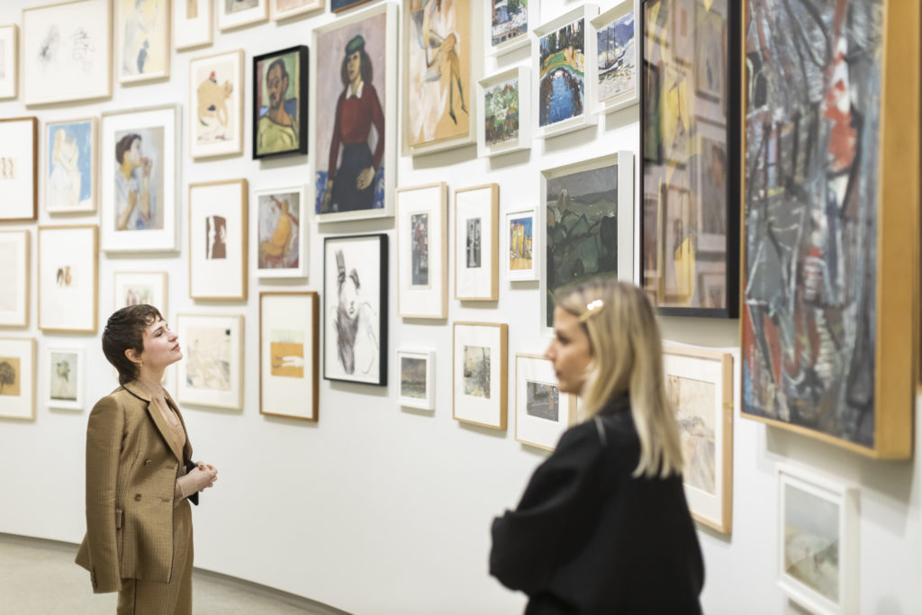 Visitors admiring "Artistic License: Six Takes on the Guggenheim Collection" at the Guggenheim. Photo: Scott Rudd. 