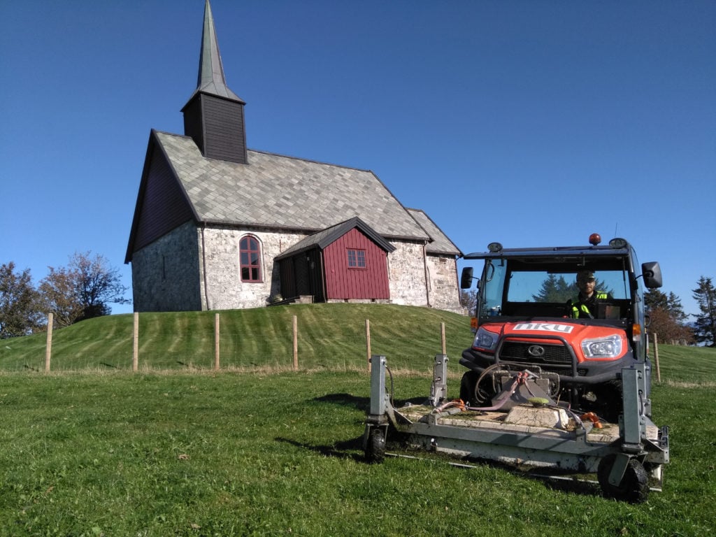 The georadar used in the discovery of the Viking ship is seen in front of Edøy Church, where archaeologists originally looked before finding evidence of the Viking ship in a farmer's field.