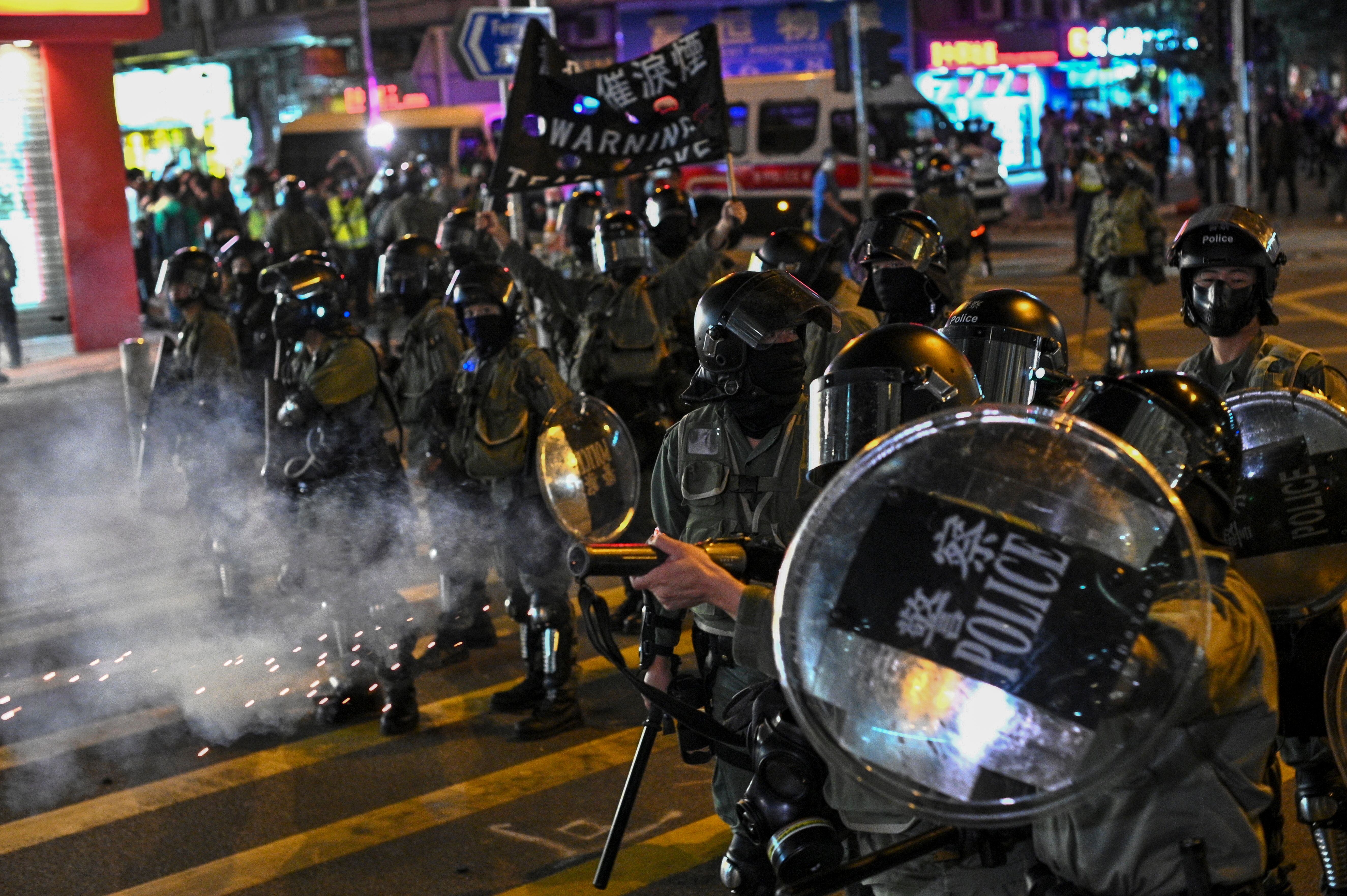 Police fire tear gas during a protest at Hung Hom area in Hong Kong on December 1, 2019. Photo by Philip FONG/AFP/Getty Images.