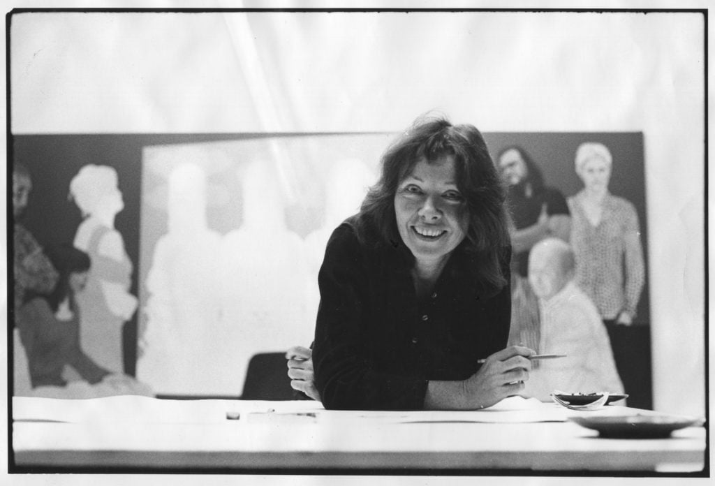 May Stevens in her Soho studio with <em>The Artist's Studio (After Courbet)</em> 1974. Photo by Joyce Ravid.
