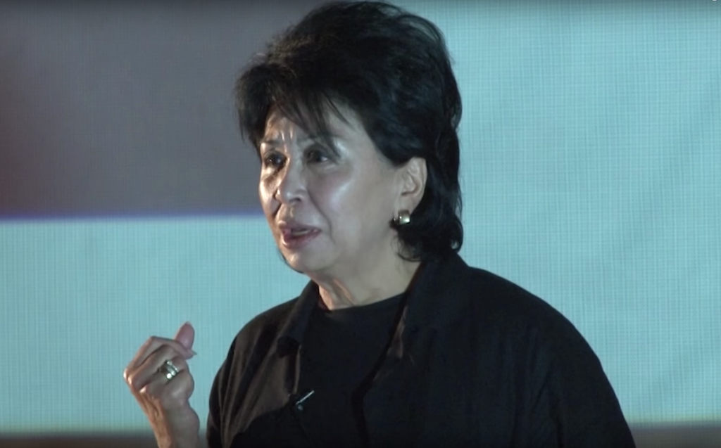 Mira Dzhangaracheva giving a TEDx Talk in 2016.