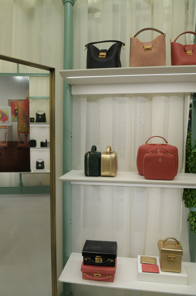 Mark Cross handbags on display. Image courtesy Artnet and Mark Cross.