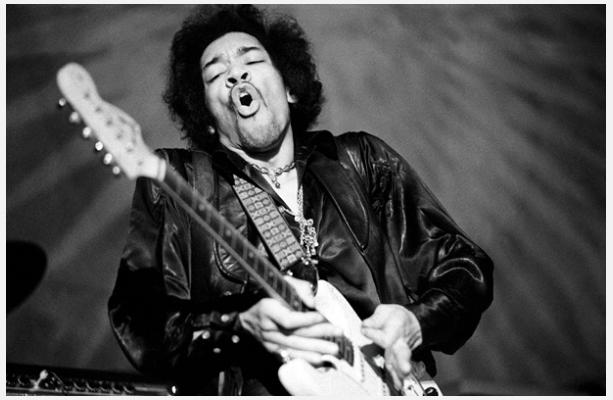 Baron Wolman, Jimi Hendrix performs at Fillmore Auditorium, San Francisco, February 1, 1968 (1968). Photo courtesy of Iconic Images/Baron Wolman.