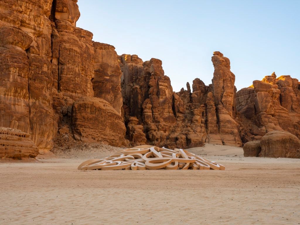 eL Seed, Mirage installation view at Desert X AlUla, photo by Lance Gerber, courtesy the artist, RCU and Desert X.