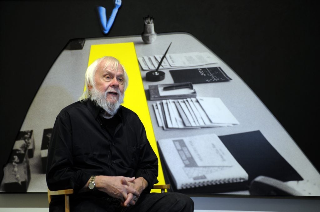 John Baldessari gives an interview at the Metropolitan Museum of Art in 2010. Photo: Timothy A. Clary/AFP via Getty Images.